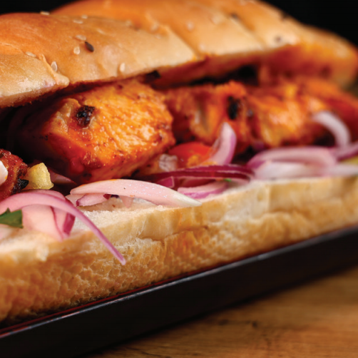 Tovuq shish ekmek arasi